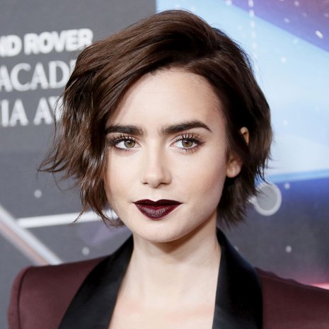 Näyttelijä Lily Collins pätkäisi hiuksensa viime vuonna lyhyiksi. Kuva: <span class="photographer">Reuters</span>